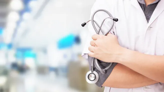 doctor-with-stethoscope-hands-hospital-backgroundjpg